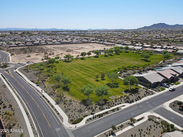 birds eye view of property featuring a mountain view and a residential view