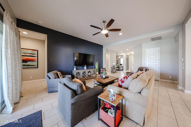 living room with recessed lighting, visible vents, a ceiling fan, light tile patterned flooring, and baseboards