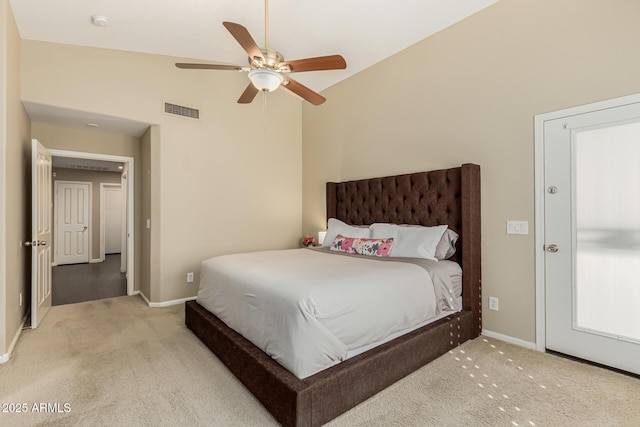 bedroom featuring vaulted ceiling, carpet flooring, and ceiling fan