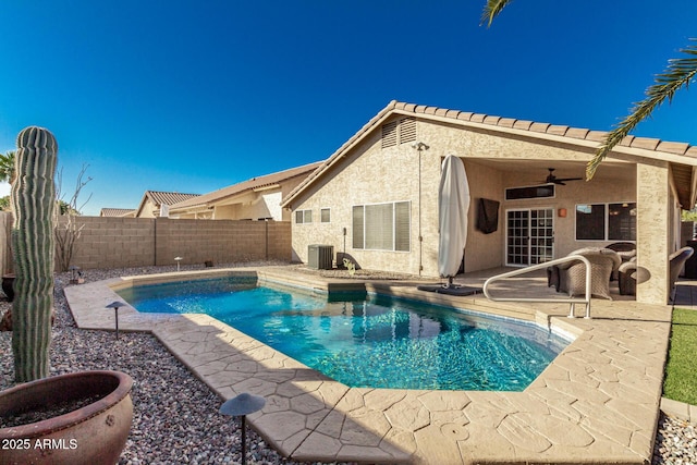 view of swimming pool featuring a patio, ceiling fan, and central air condition unit