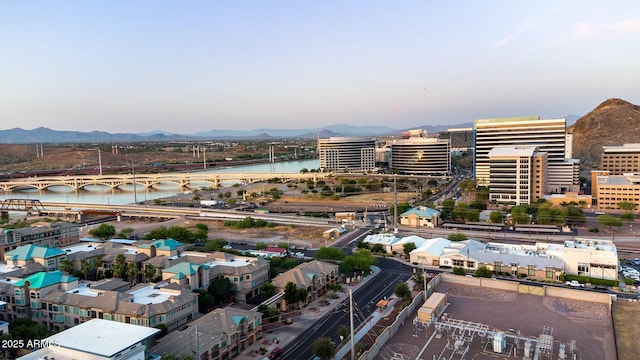 bird's eye view with a water and mountain view and a city view