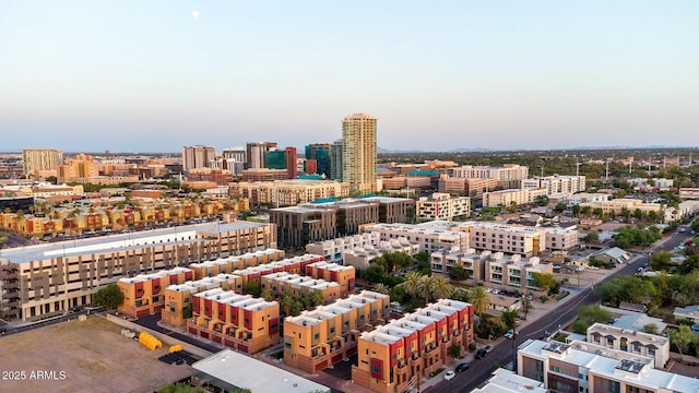 birds eye view of property featuring a city view