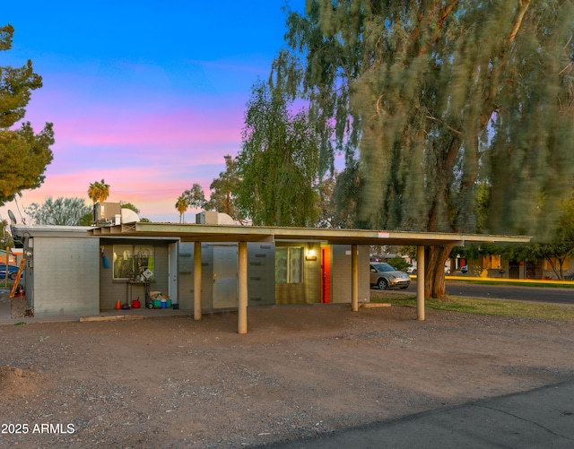 view of front facade featuring a carport