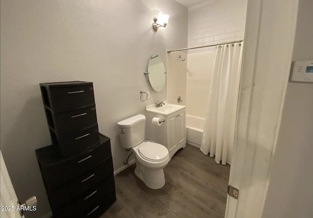 full bath featuring vanity, shower / bathtub combination with curtain, toilet, and wood finished floors