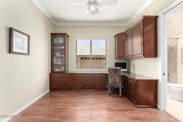 16540 E El Lago Blvd Unit 2, Fountain Hills, AZ 85268 - home office featuring a ceiling fan, light wood-style floors, crown molding, built in study area, and baseboards