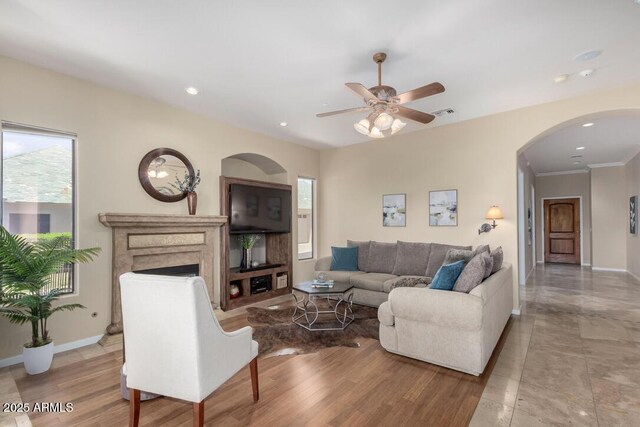 16540 E El Lago Blvd Unit 2, Fountain Hills, AZ 85268 - living area featuring plenty of natural light, arched walkways, a ceiling fan, baseboards, and recessed lighting