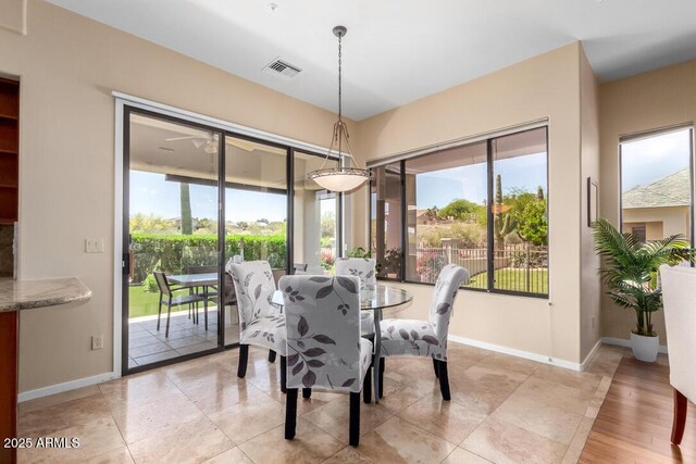 16540 E El Lago Blvd Unit 2, Fountain Hills, AZ 85268 - dining room with baseboards and light tile patterned floors