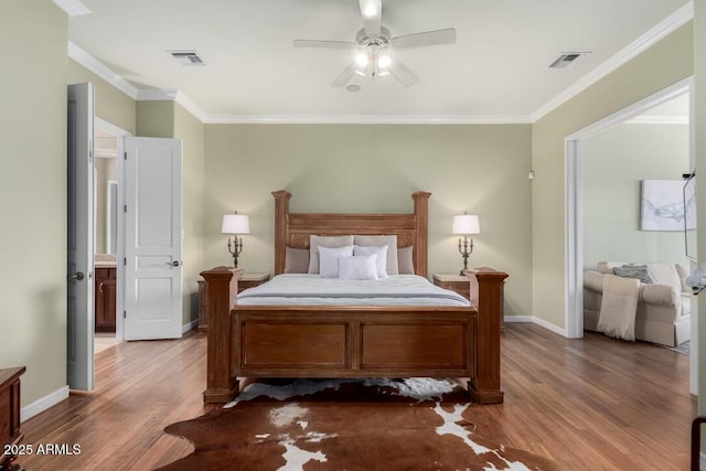 16540 E El Lago Blvd Unit 2, Fountain Hills, AZ 85268 - bedroom featuring wood finished floors, ornamental molding, baseboards, and ceiling fan