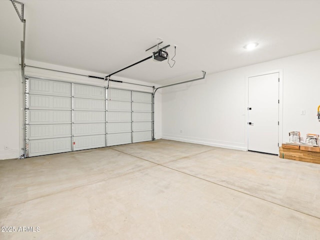 garage featuring a garage door opener