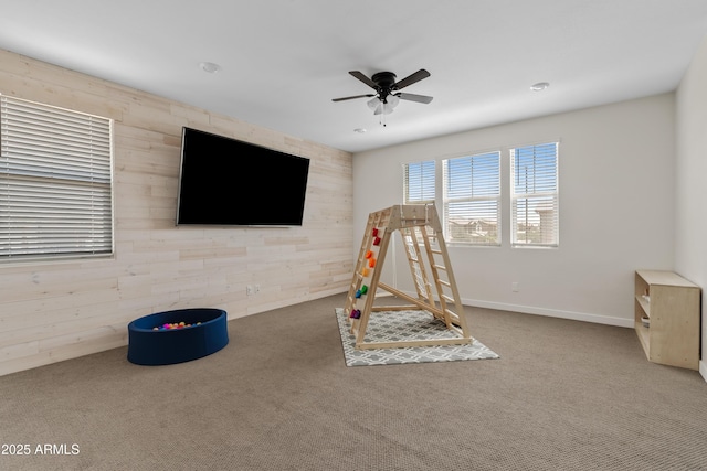1800 S Jesse Pl, Chandler, AZ 85286 - rec room with carpet, a ceiling fan, and wooden walls