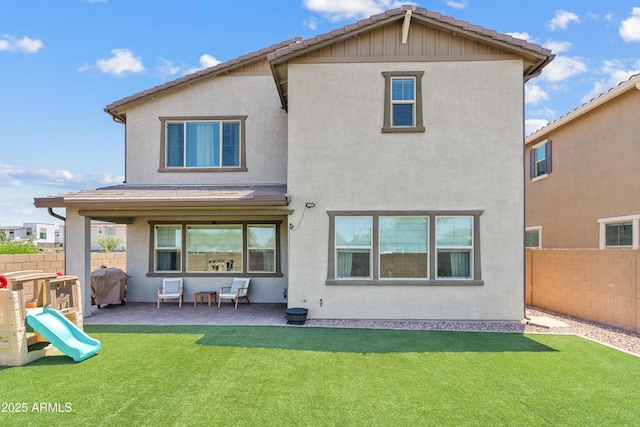 1800 S Jesse Pl, Chandler, AZ 85286 - rear view of property featuring a fenced backyard, a patio area, and stucco siding