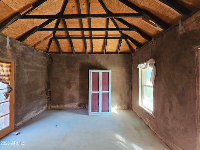 83 Ok St, Bisbee, AZ 85603 - unfurnished room with concrete flooring and high vaulted ceiling
