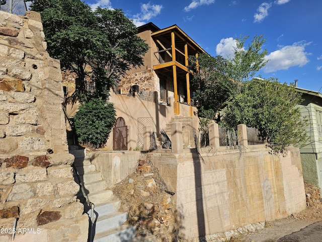 83 Ok St, Bisbee, AZ 85603 - view of front of property featuring stucco siding