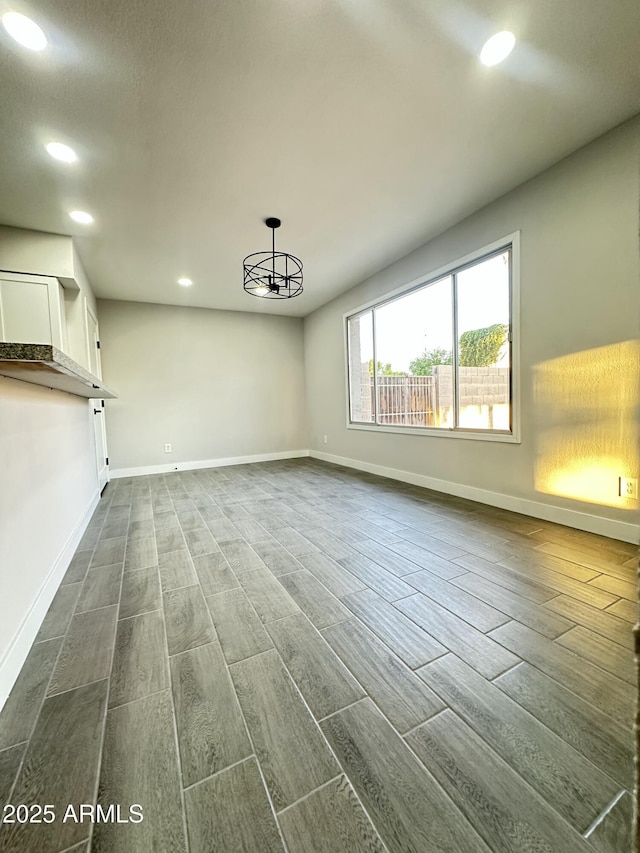 4902 S Fair Ln, Tempe, AZ 85282 - unfurnished room with dark wood-type flooring, recessed lighting, and baseboards
