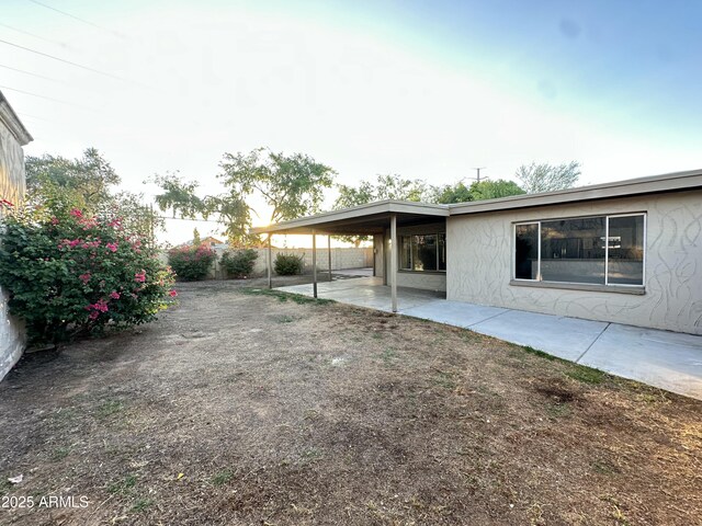 4902 S Fair Ln, Tempe, AZ 85282 - rear view of house with a patio area, stucco siding, and a fenced backyard