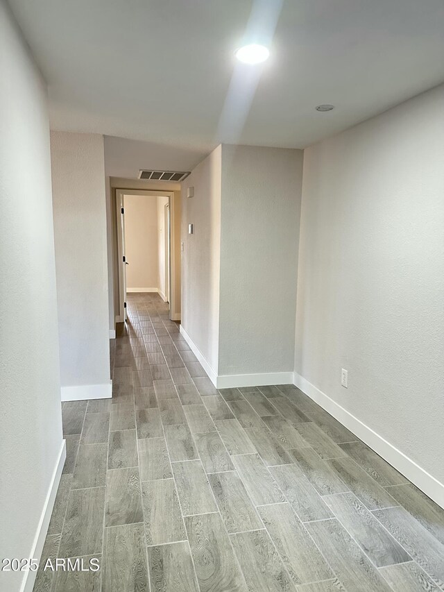 4902 S Fair Ln, Tempe, AZ 85282 - hall featuring wood finished floors and baseboards