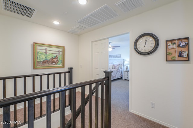 corridor featuring carpet floors