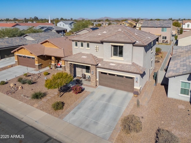 front of property with a garage