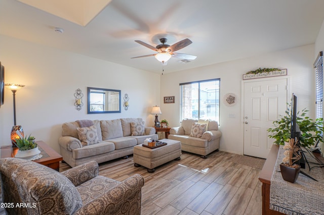 living room featuring ceiling fan