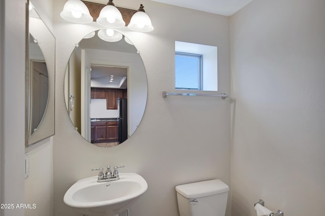 280 S Evergreen Rd Unit 1296, Tempe, AZ 85288 - half bath featuring a sink and toilet