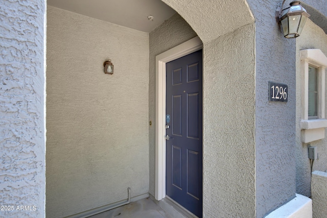 280 S Evergreen Rd Unit 1296, Tempe, AZ 85288 - doorway to property with stucco siding