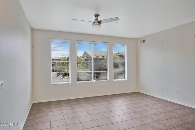 280 S Evergreen Rd Unit 1296, Tempe, AZ 85288 - empty room with a ceiling fan and light tile patterned floors