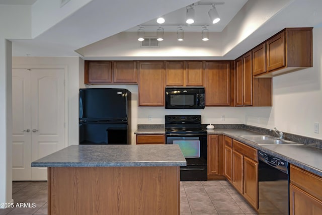 280 S Evergreen Rd Unit 1296, Tempe, AZ 85288 - kitchen with black appliances, light tile patterned floors, dark countertops, a center island, and rail lighting