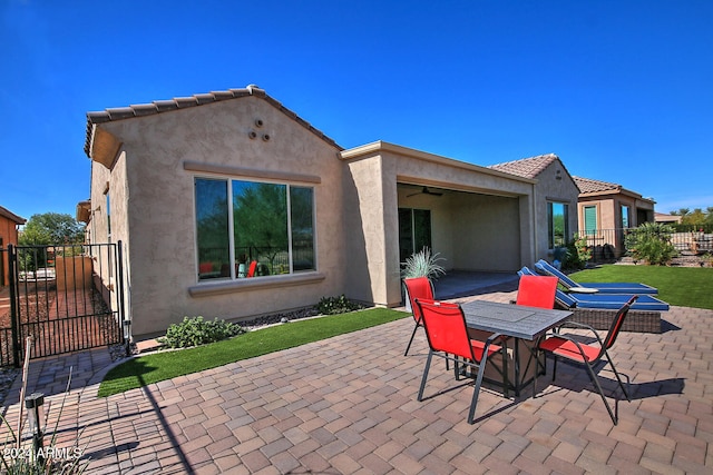 rear view of property with a patio