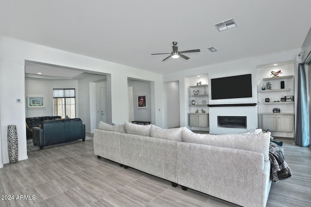 living room featuring ceiling fan