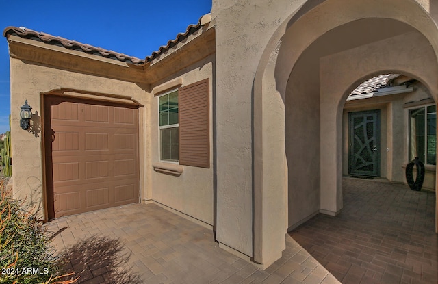 exterior space with a garage