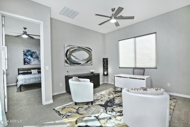 interior space featuring carpet and ceiling fan