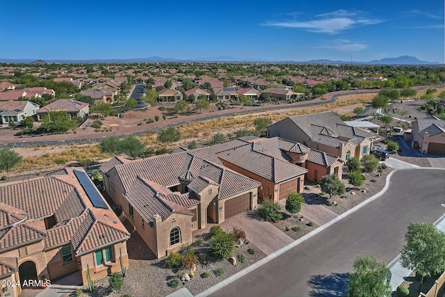 bird's eye view with a mountain view