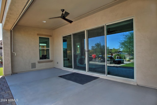 view of patio with ceiling fan