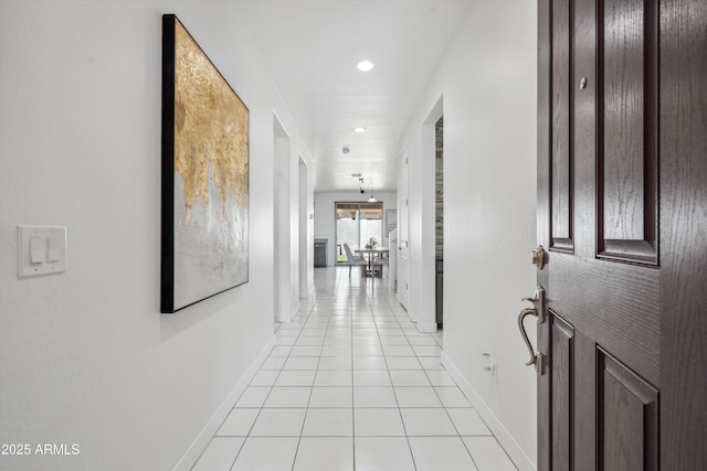22341 N 100th Ln, Peoria, AZ 85383 - hallway with recessed lighting, baseboards, and light tile patterned floors
