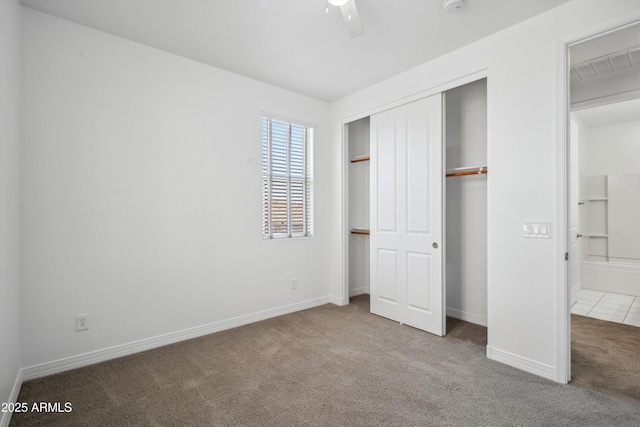 22341 N 100th Ln, Peoria, AZ 85383 - unfurnished bedroom with carpet floors, a closet, and baseboards