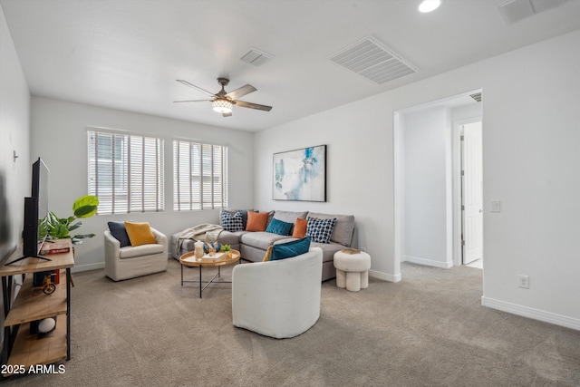22341 N 100th Ln, Peoria, AZ 85383 - carpeted living area with ceiling fan and baseboards