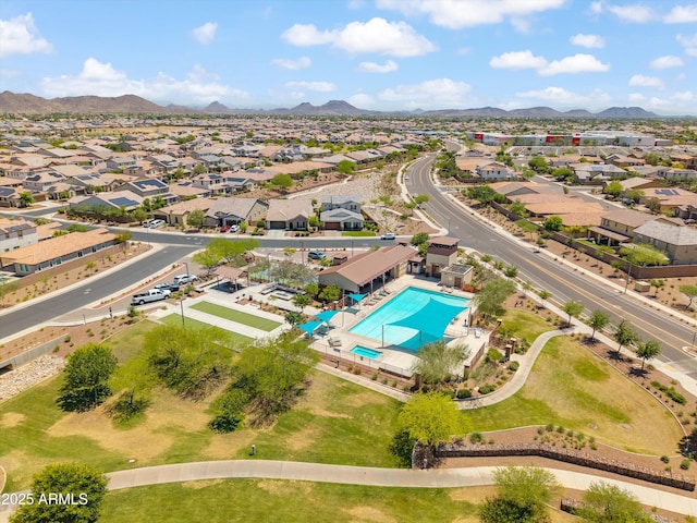 22341 N 100th Ln, Peoria, AZ 85383 - aerial perspective of suburban area with a mountain backdrop and a pool area