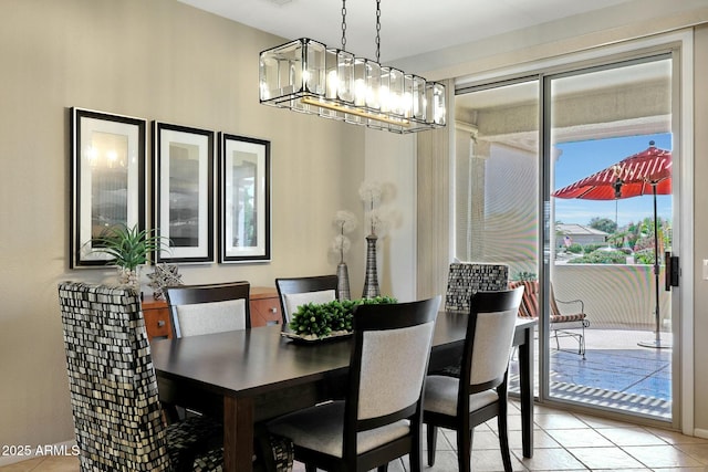 dining space featuring light tile patterned flooring