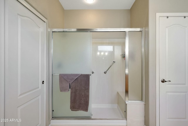 full bathroom with a stall shower