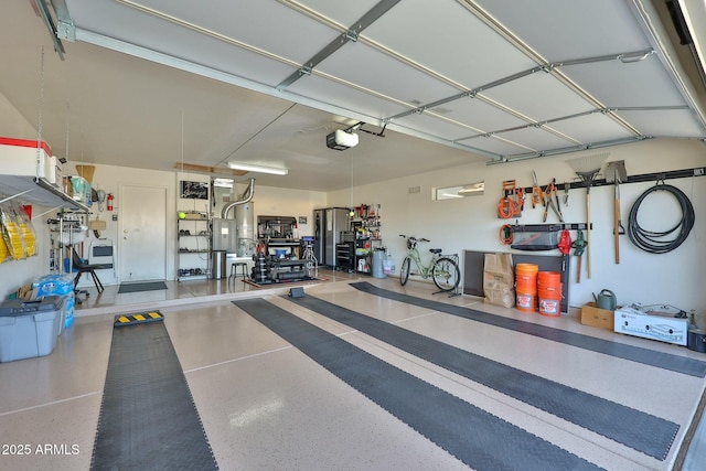 garage featuring a garage door opener