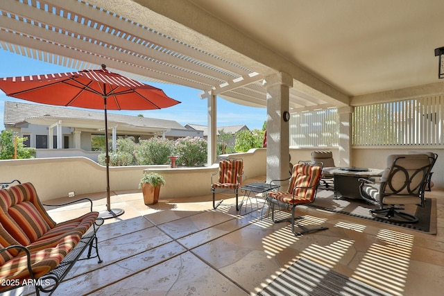 view of patio featuring a pergola