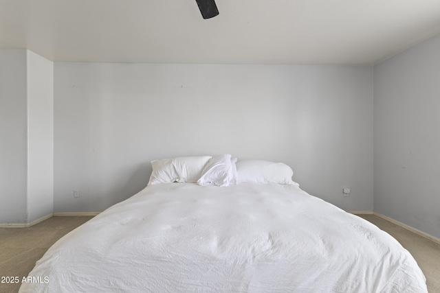 bedroom with ceiling fan and carpet