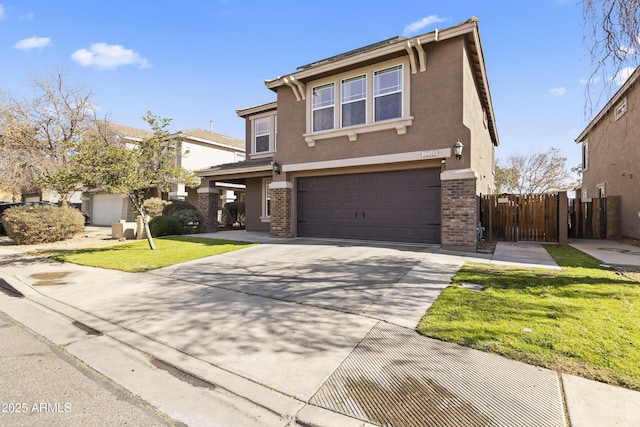 front facade featuring a garage and a front lawn