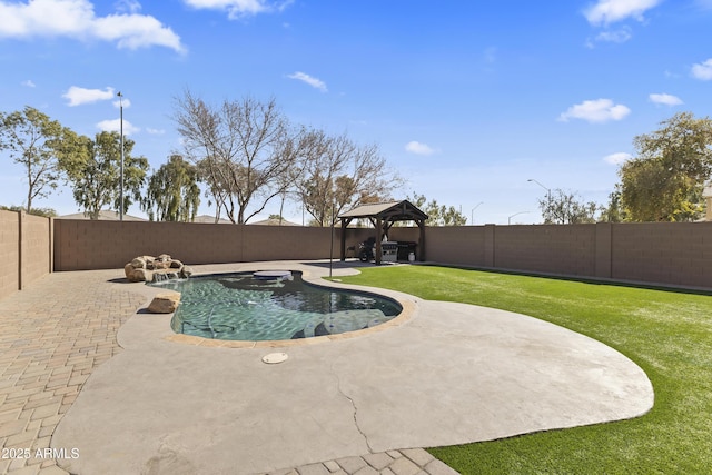 view of pool featuring a gazebo, a jacuzzi, a lawn, and a patio area