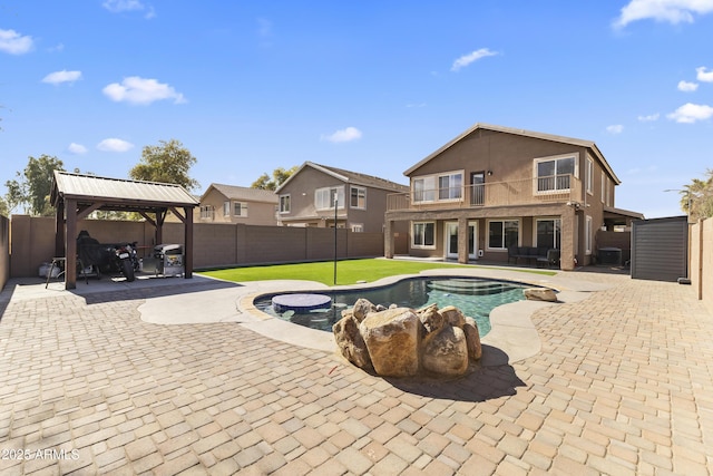 view of pool with a gazebo and a patio area