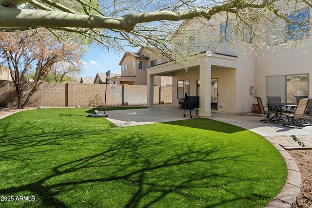 view of yard featuring a patio area and fence