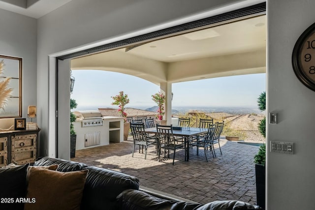 view of patio / terrace with a grill, area for grilling, and an outdoor hangout area