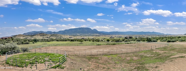 view of mountain feature with a rural view