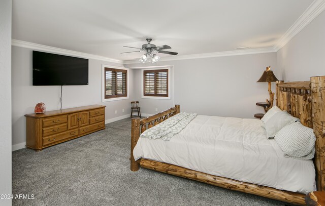 bedroom with carpet flooring, ceiling fan, and crown molding