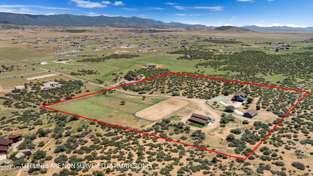 bird's eye view with a mountain view and a rural view